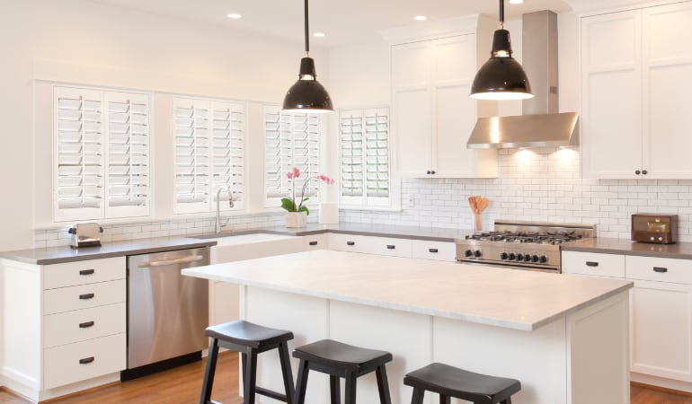 Plantation shutters in a bright Dallas kitchen.